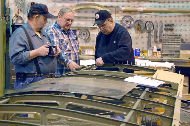 Tom, Rich, and Ralph working on the wing for the L-21